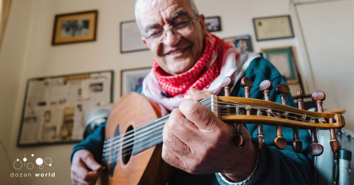 Musician playing the oud, a key instrument in Arabic maqam Hijaz performance — Dozan World